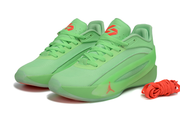 Fluorescent green pair shown from the front three-quarter angle with coral tongue logos.