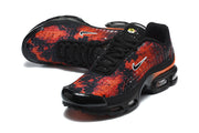 Pair of black and red-orange Nike sneakers shown from above and at an angle.