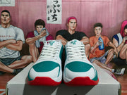 Front view of the pair showing white laces, teal perforated toe panels, red outsole accents, and Nike tongue logos.