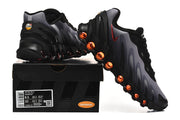 Nike Air Max DN8 sneakers beside a box label showing EU 40 and US Men 7.5 / US Women 9.