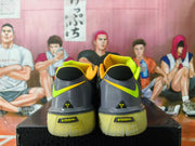 Rear view showing the gray heels, yellow-green Nike Swooshes, Kobe logos, and visible Zoom markings.
