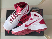 Top and side views of the white and red high-top basketball shoes.