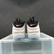 Rear view of the pair showing black collars, white heels, and red-accented Swoosh details.