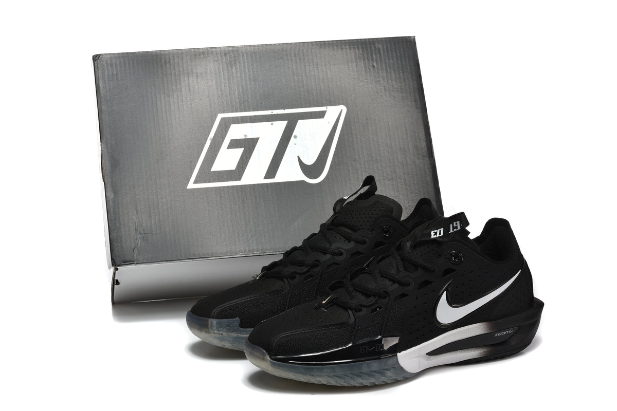 Black Nike G.T. Cut 3 basketball shoes with white Swoosh logos and translucent outsoles, shown beside a shoe box.