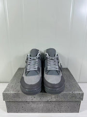 Front view of the pair showing the tonal laces, perforated detailing, and grey toe panels.