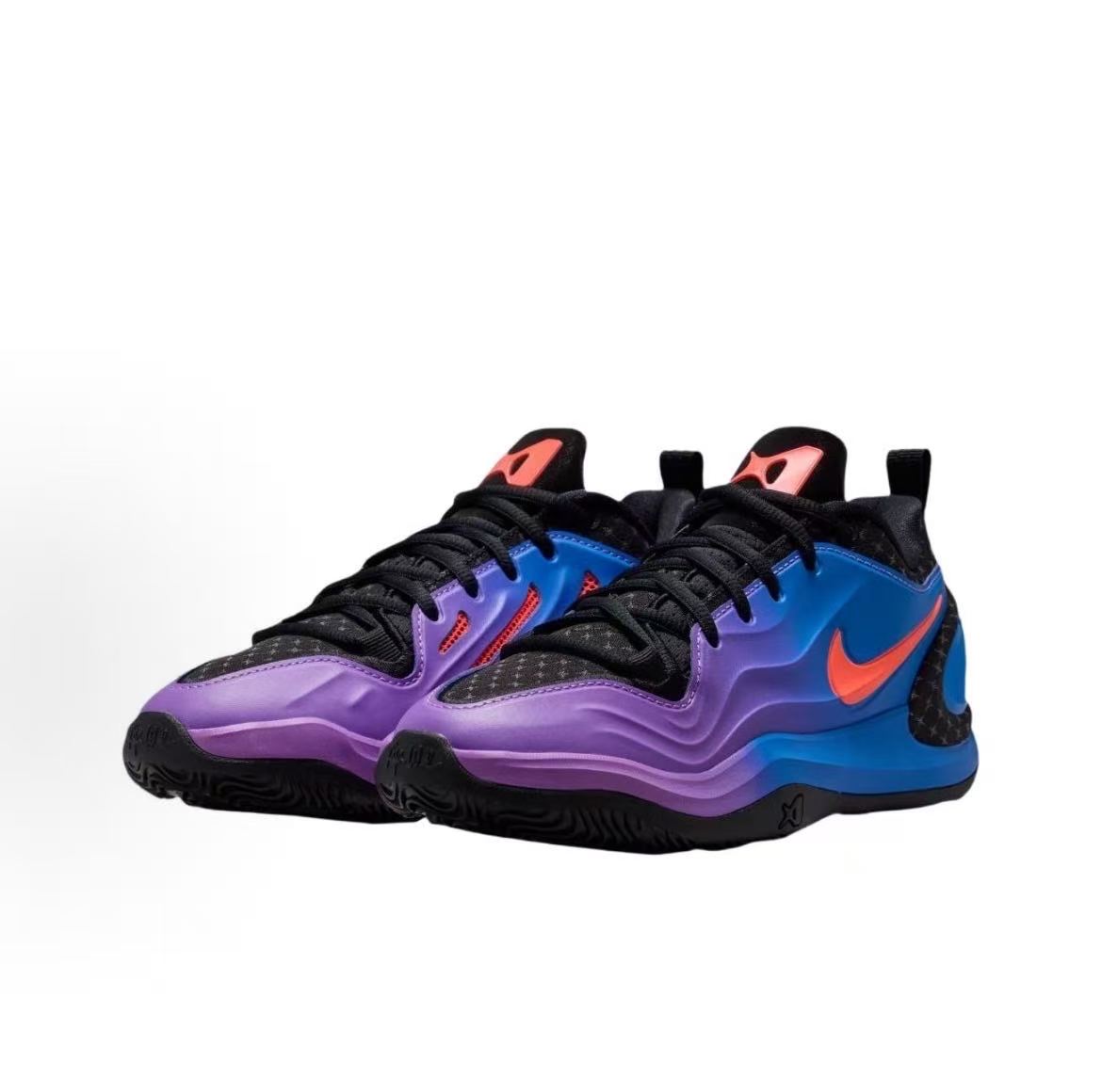 Pair of Nike 511-6 sneakers in blue and purple with black laces and red-orange Swoosh accents