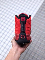 Rear view showing the Jordan heel label, red heel panels, and number 23 detail.