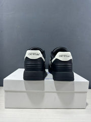 Rear view of the pair showing white branded heel panels and padded black heel sections.