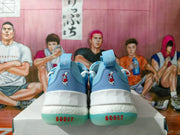 Rear view showing heel character graphics and aqua outsole sections
