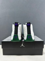 Rear view of the pair showing black heel pull tabs, Jordan branding, and purple 23 details.