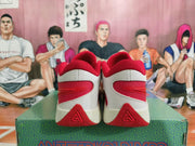 Rear view of white and red Anta KT 10 basketball shoes showing the heel and red outsole details