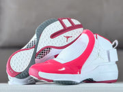 Duplicate side view showing the sneaker and its patterned outsole.