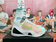 Side view of a high-top basketball shoe with a white upper and bright multicolor accents