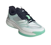 White and pale green basketball sneaker with black upper panels and mint outsole accents.
