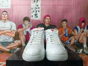 Front view showing perforated toe panels and white laces on the basketball shoes