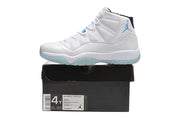 Side view of a white Jordan sneaker on its box; the box label shows a 4Y sample size.