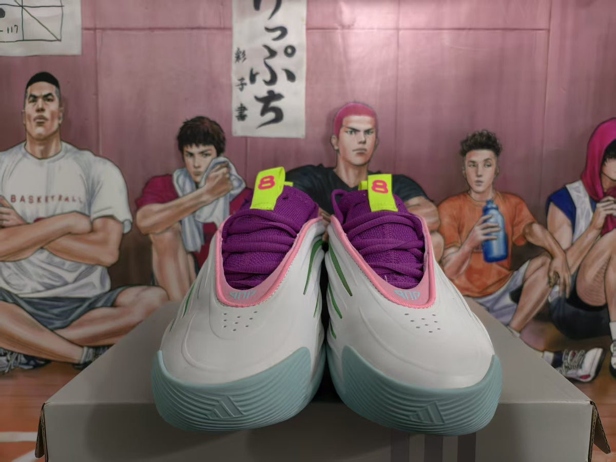 Front view of white basketball shoes with purple laces and pale aqua outsoles