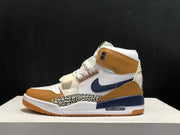 Opposite side profile of the high-top sneaker with white upper panels, tan overlays, navy accents, and gum outsole.