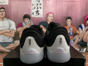 Rear view showing the white heel panels, black collars and Jumpman heel branding.