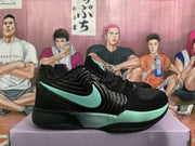 Side profile of a black basketball sneaker with mint-green side branding, glossy overlays, and a sculpted outsole.