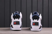 Rear view showing the heel pull tabs, black heel details, and rectangular heel branding patches.