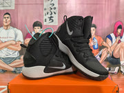 Pair of black and grey Nike Hyperdunk high-top basketball shoes