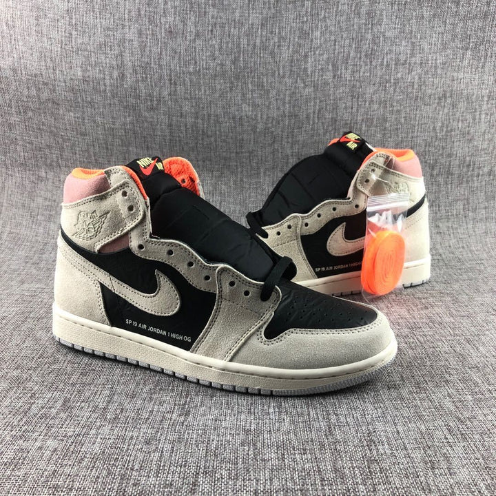 Pair of high-top Jordan sneakers in gray, black, pink, orange, and off-white, shown from a three-quarter view.