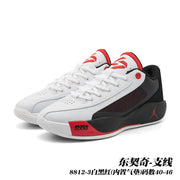 Pair of white, black and red Jordan 8812 basketball shoes in a front three-quarter view.