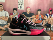 Side view of a black Nike basketball shoe with teal Swoosh, pink accents, and a visible ZoomX marking.