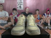 Front view showing the paired Nike sneakers, light laces, padded tongues, and textured toe areas.