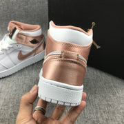 Close-up rear view showing the rose-gold heel panel and white collar.
