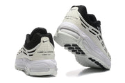 Rear view showing heel panels with Comme des Garçons Homme Plus text