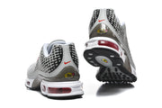 Rear and outsole views of grey Nike Air Max Plus VIII sneakers.