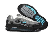 Pair of sneakers shown from the side and outsole, with grey, black and turquoise details