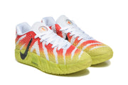 Angled front view of the pair showing white laces, coral and yellow patterned uppers, and yellow outsoles.