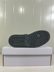Black rubber outsole with a circular traction pattern and segmented edges.
