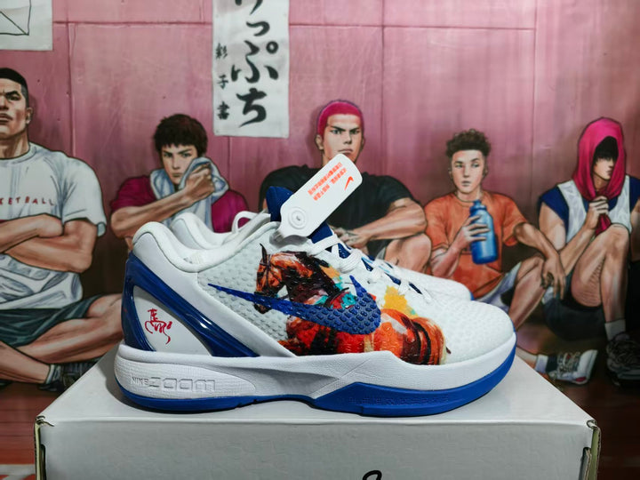 Side view of a white and blue Nike basketball shoe with colorful illustrated side artwork.