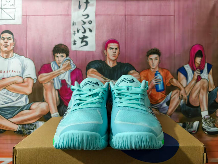 Front view of light blue ASICS Swiftace basketball shoes with dark laces and logo.