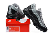Nike Air Max 95 sneakers beside a shoebox showing a size 8.5 label and style code IM9637 001