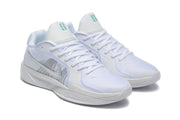 Angled view of a pair of white Nike Sabrina 2 shoes with mint accents and side Swooshes.