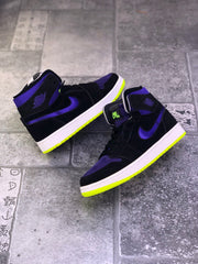 Pair of black and purple high-top sneakers displayed from angled side views.