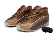 Brown pair shown from the front three-quarter angle with patterned uppers and cream piping.