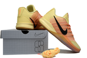 Yellow and orange Nike Sabrina 3 shoes displayed with a shoe box