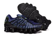 Nike Shox TL sneakers shown from the side and outsole.