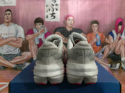 Rear view of the Brooks shoes showing patterned heel sections and sculpted white midsoles