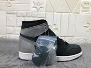 Three-quarter rear-side view of a sneaker with a clear bag containing additional coiled laces.