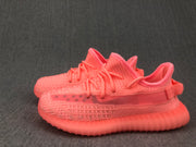 Pair of pink sneakers shown together from a side angle.