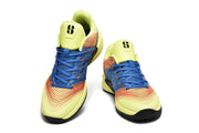 Pair of yellow, blue, and orange Nike Kobe 5 Protro basketball shoes viewed from the front