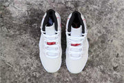 Top view of the paired sneakers showing the lacing layout and black collar lining.