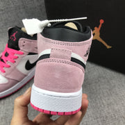 Close-up of the pink heel, white midsole and black collar details.